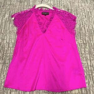 Silk top with lace details.